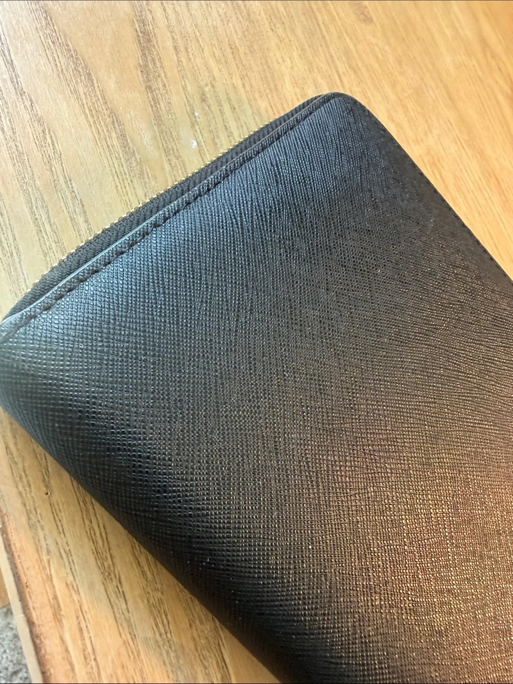 kate spade black zip-around saffiano leather wallet